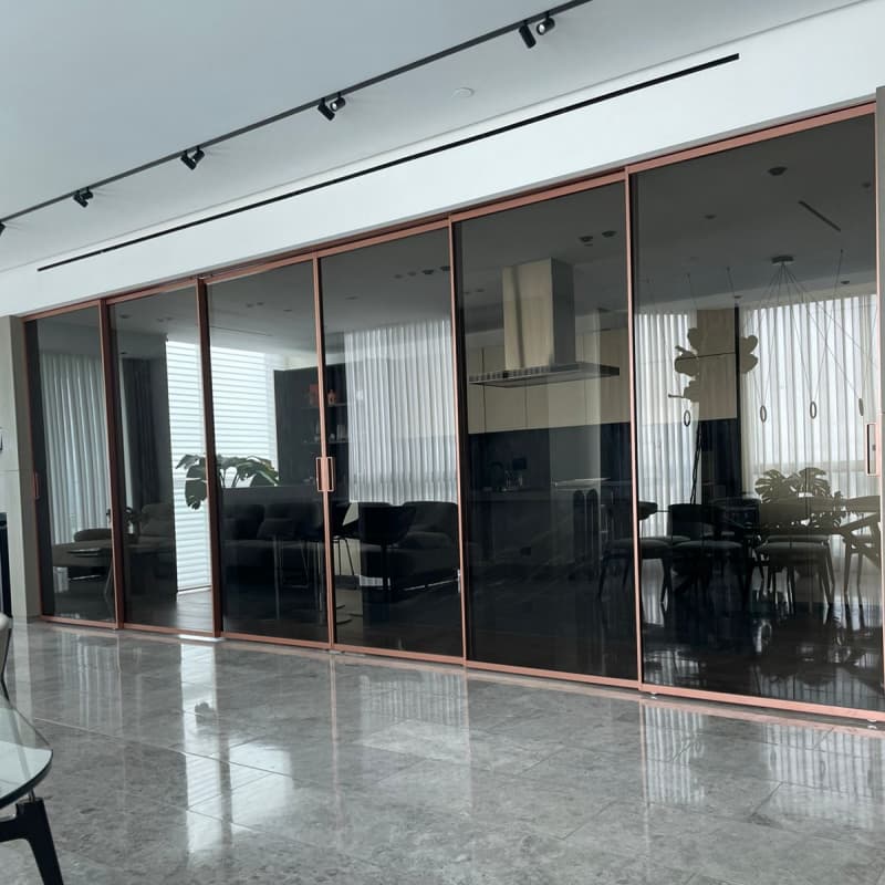 Rose Gold Frame Glass Sliding Doors | Manufacturer for Apartments & Villas